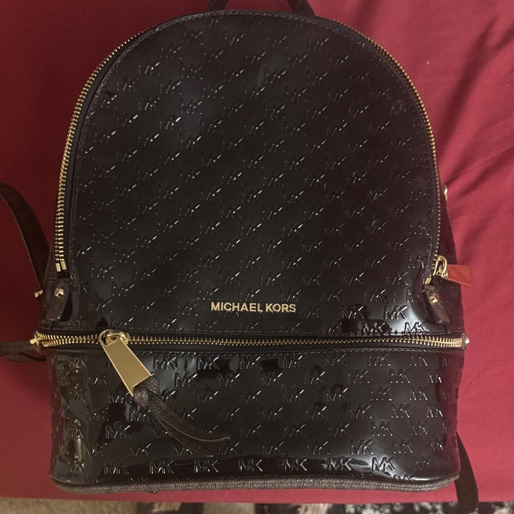 Michael Kors Glossy Black Backpack with Gold Accents